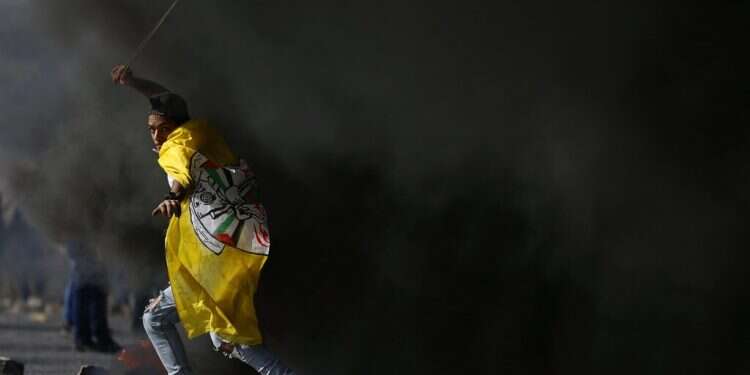 Palestinians protest US settlement decision in 'day of rage'