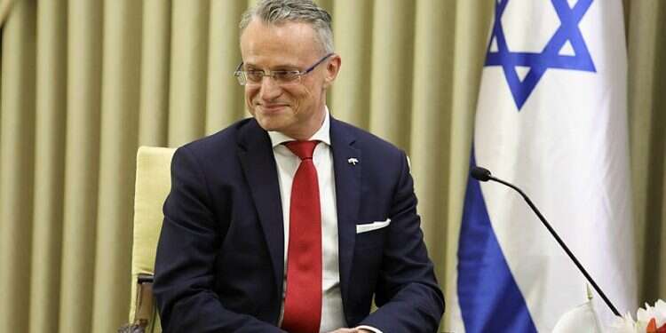 Israeli convicted of assault for spitting on Polish envoy