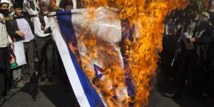 Report: German parties block bill barring setting fire to Israeli flag