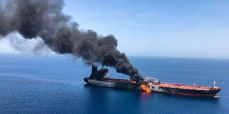 An oil tanker is seen after it was attacked at the Gulf of Oman, June 13, 2019 A powder keg that could engulf the world