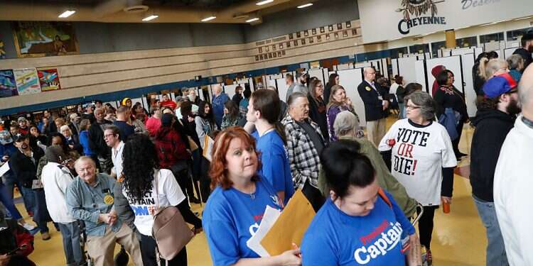 Nevada Caucus voters line up to participate inside the Caucus at Cheyenne High School in North Las Vegas, Nevada, US He is a Republican activist, but caucused for Bernie Sanders