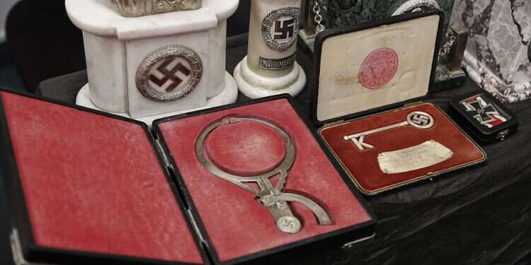 Detail of artifacts bearing Nazi symbols that were recovered by the Argentine Federal Police (PFA) List of 12,000 Nazis may reveal fate of stolen Jewish funds