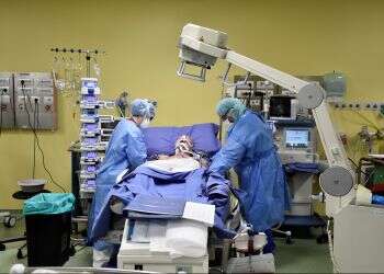 Global COVID-19 cases top 500,000, protective gear lacking