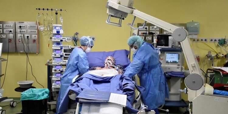 Global COVID-19 cases top 500,000, protective gear lacking