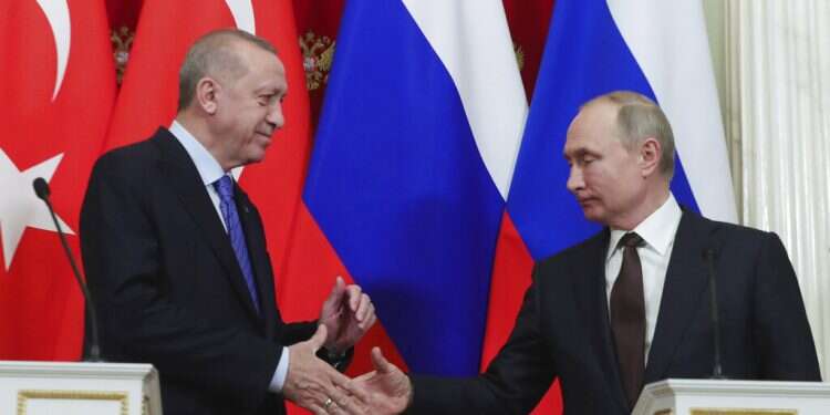 Russia's President Vladimir Putin, right, and Turkish President Recep Tayyip Erdoğan shake hands after a joint news conference on Thursday Syrian ceasefire creates new reality in Idlib, with Erdoğan and Putin in charge