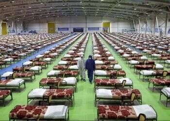 Iran defends virus response as Syria reports first death