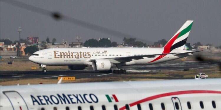 An Emirates Airline Boeing 777-200LR lands at Mexico City International Airport World's largest aviation body urges ME gov'ts to help contain coronavirus