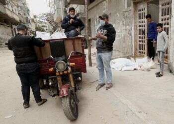 UN begins home food drops for Gaza's needy to stem virus