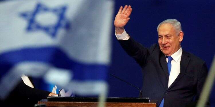 Prime Minister Benjamin Netanyahu waves to supporters following the announcement of exit polls in Israel's election at his Likud party headquarters in Tel Aviv, March 3 Netanyahu secures backing to form new Israeli government