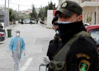 Palestinians easing coronavirus restrictions in West Bank