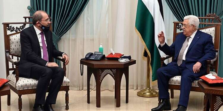 Jordan's Foreign Minister Ayman Safadi and Palestinian President Mahmud Abbas in Ramallah, Thursday Jordanian FM: Applying sovereignty will severely strain peace deal