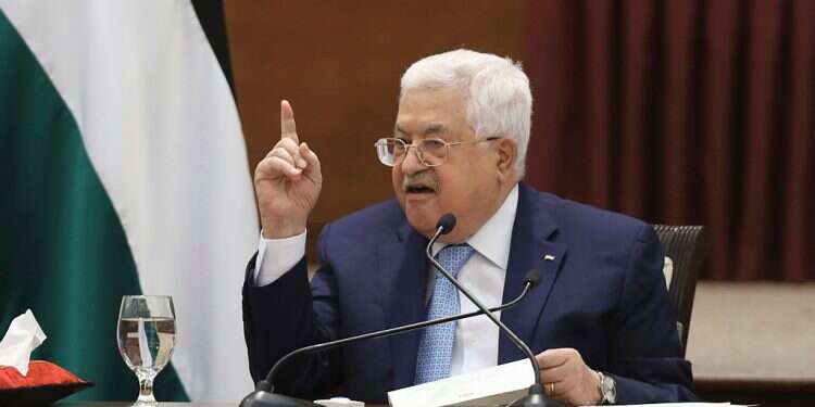 Palestinian President Mahmoud Abbas Palestinian official warns Abbas willing 'to let PA collapse' to foil Israel's sovereignty bid