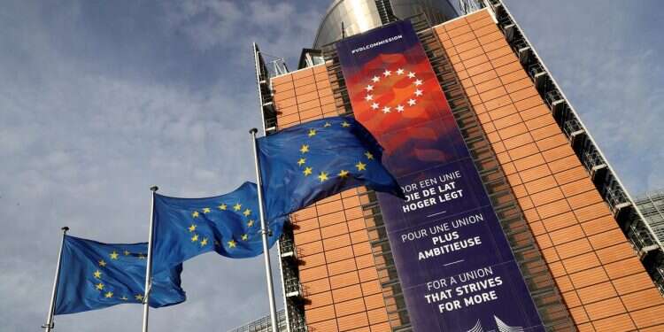 European Union flags fly outside the European Commission headquarters in Brussels, Belgium 'EU policies on Israel influenced by political pressure from radical elements'