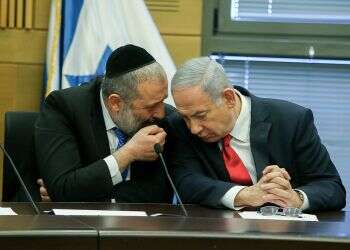 Likud blasts Haredi faction for forging ties with Blue and White