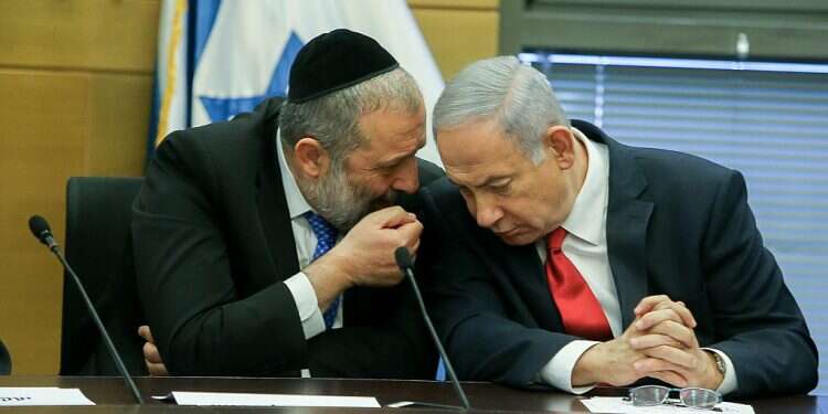 Likud blasts Haredi faction for forging ties with Blue and White