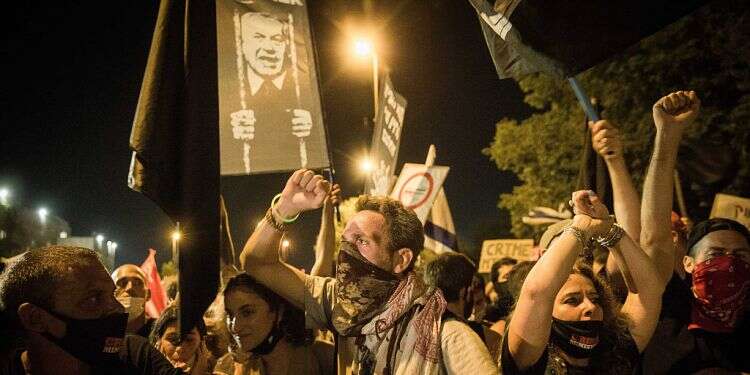 Thousands in Jerusalem, Tel Aviv protest PM's handling of pandemic