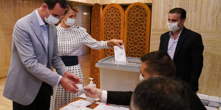 Syrians vote for new parliament under strict COVID procedures