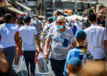 Poll: Israelis fear coronavirus pandemic, have somber future outlook