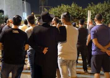 Slain rabbi laid to rest, Shin Bet probes attacker's background