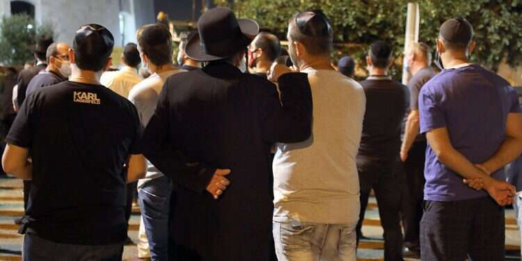 Slain rabbi laid to rest, Shin Bet probes attacker's background