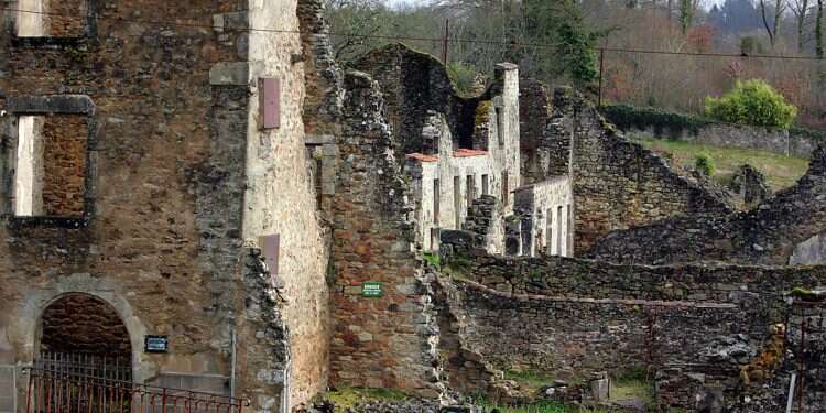 Holocaust-denying graffiti found on wall in French village sacked by Nazis