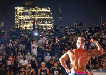 Masks, COVID-19 no match for Israeli bodybuilders