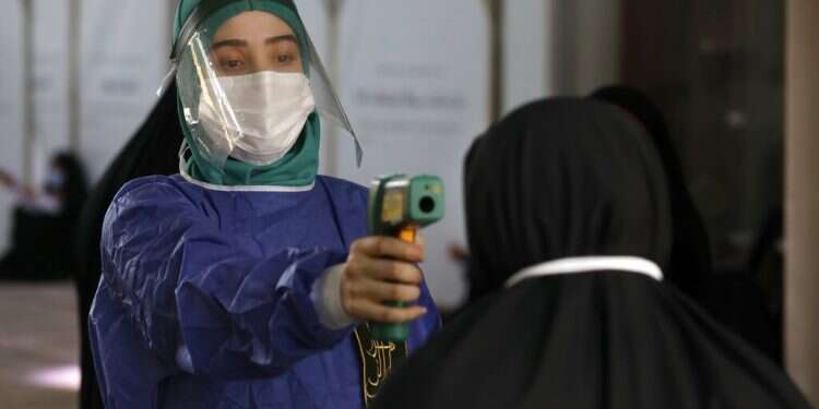 Report: Iran covering up true COVID death toll