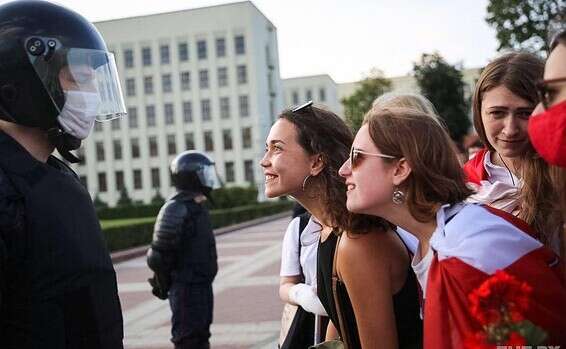 Nadia Pogodaeva (center) confronts a police officer during the recent protests in Belarus 'Women have a voice that should be heard'