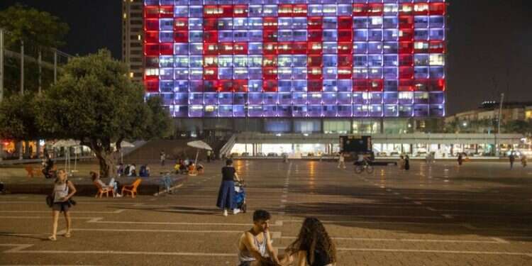 The Tel Aviv City Hall building lit up with the words for peace in Hebrew, Arabic and English in honor of the peace deals between Israel, the United Arab Emirates and Bahrain DP World, Israeli firm to bid for Haifa Port privatization