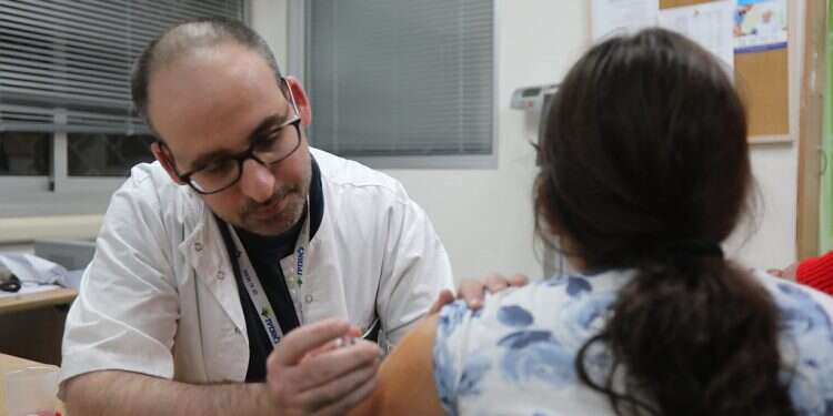 A child receives the flu shot at a Leumit health clinic in Tel Aviv Israel stocks up on record 4 million flu shots ahead of winter