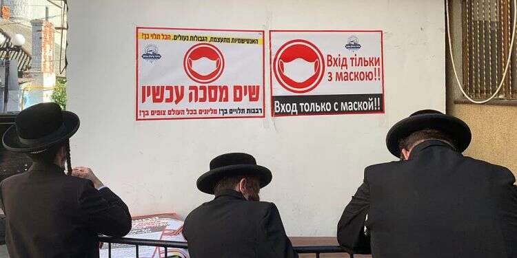 Hassidim paying in Uman Ukraine to allow 3,000 Hassidim to make annual pilgrimage to Uman
