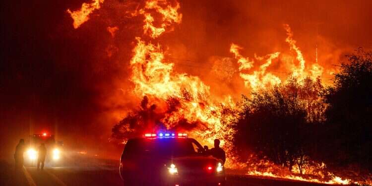 Explosive wildfires across California stoked by fierce winds