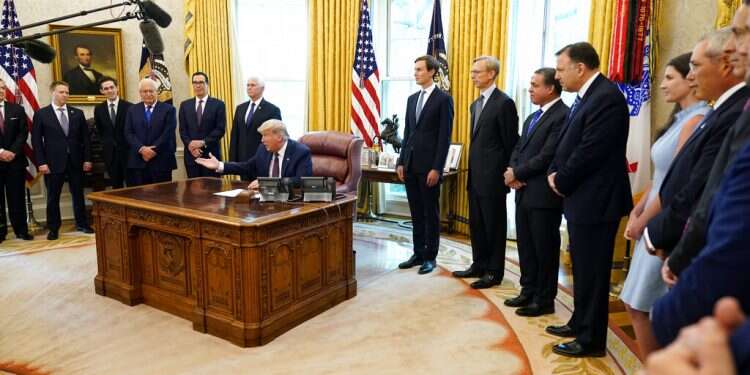 President Donald Trump speaks in the Oval Office of the White House on Friday, Sept. 11, 2020, in Washington Trump highlights foreign policy wins as he woos voters