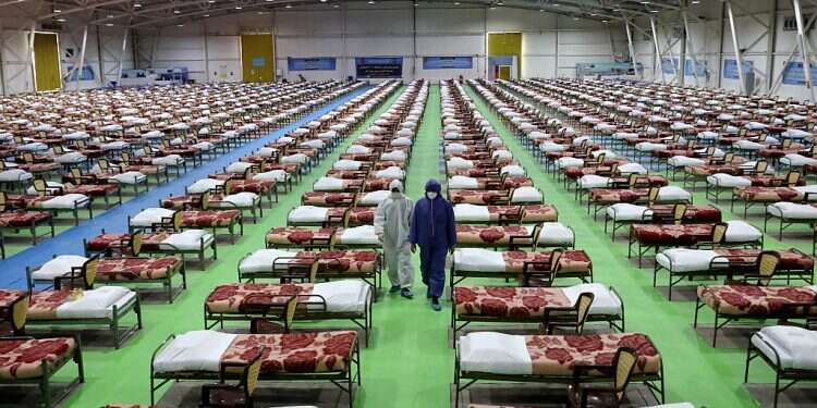 A temporary 2,000-bed hospital for COVID-19 coronavirus patients set up by the Iranian army at the international exhibition center in northern Tehran, Iran, on Thursday, March 26, 2020