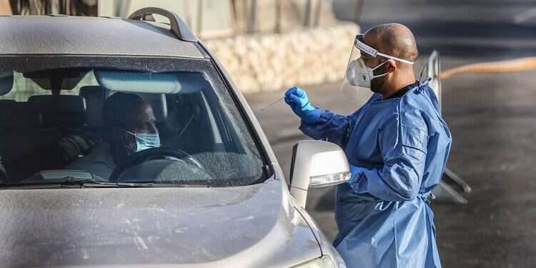 A drive-through COVID testing site City of Rehovot offers free COVID testing for all residents