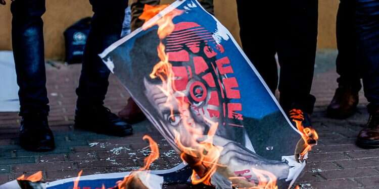 Top Palestinian cleric calls for 'day of rage' over Macron's Islam rhetoric