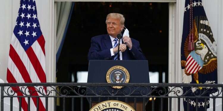 President Donald Trump removes his face mask to speak from the Blue Room Balcony Doctor says Trump not contagious, stays mum on tests