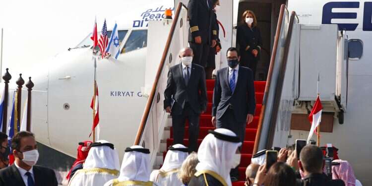 Israeli National Security Adviser Meir Ben-Shabbat and US Treasury Secretary Steve Mnuchin arrive in Muharraq, Bahrain, 'We look forward to hosting you too,' Israeli official says after historic flight