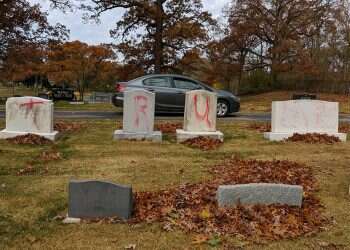 Headstones at a Jewish cemetery in Grand Rapids, Mich., spray-painted with 'TRUMP' and 'MAGA' Pro-Trump messages painted on headstones at Jewish cemetery