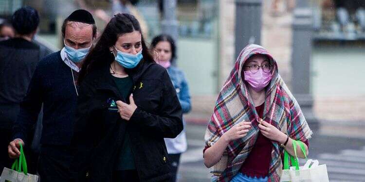 Israelis in Jerusalem, this week Israel strikes deal to receive COVID-19 vaccine as early as January
