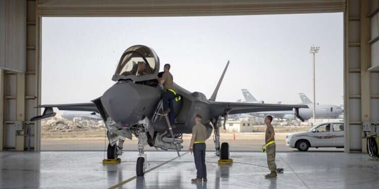 An F-35 fighter jet pilot and crew prepare for a mission at Al-Dhafra Air Base in the United Arab Emirates on Aug. 5, 2019 Trump administration formally notifies Congress it plans to sell 50 F-35 jets to UAE
