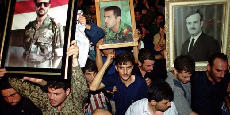 In ruins, Syria marks 50 years of Assad family rule