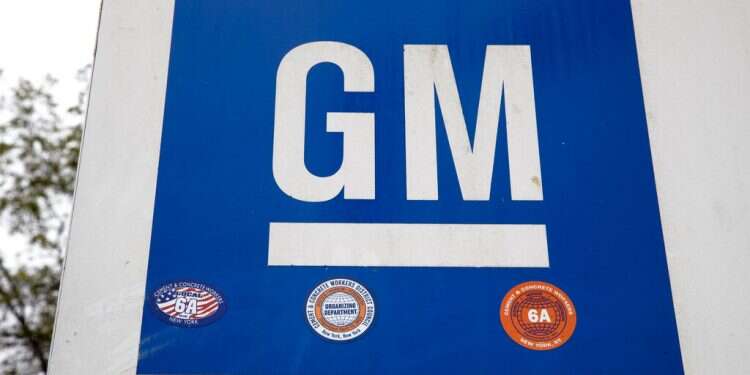 A sign at a General Motors facility in Langhorne, Pennsylvania GM: New batteries cut electric car costs