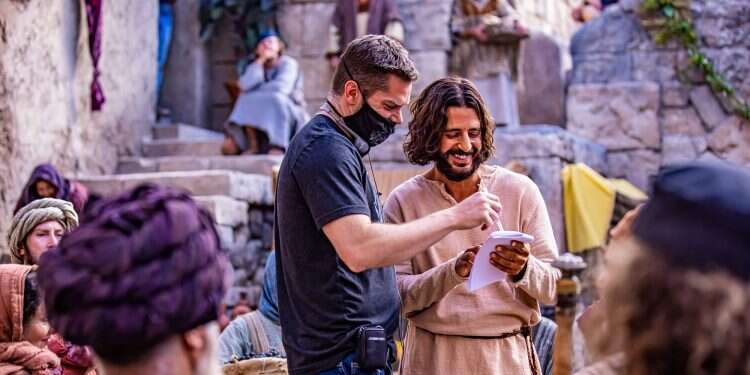 Showrunner Dallas Jenkins, left, stands with actor Jonathan Roumie, who stars as Jesus, on the set of 'The Chosen' With Utah standing in for Israel, season 2 of TV series 'The Chosen' now shooting