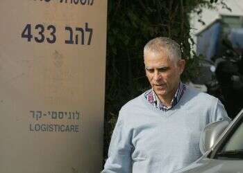 Israel Press Council: Yedioth must suspend publisher pending corruption trial's end