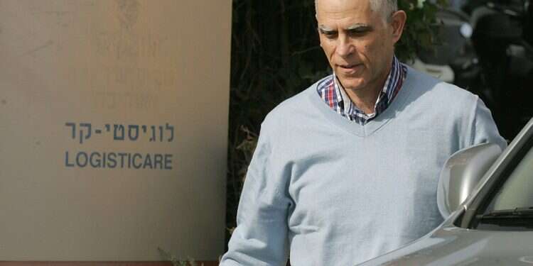 Israel Press Council: Yedioth must suspend publisher pending corruption trial's end