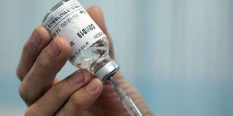 Government mulls new corona restrictions as vaccination drive gets underway