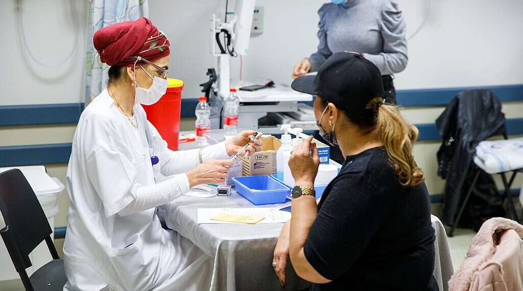 COVID vaccinations are administered at Barlizai Medical Center in Ashkelon last week Health Minister: 280,000 Israelis have received first dose of vaccine