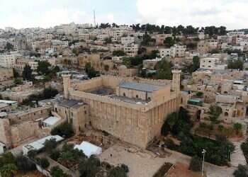 PA lambasts Hanukkah celebrations at Cave of the Patriarchs as 'war crime'