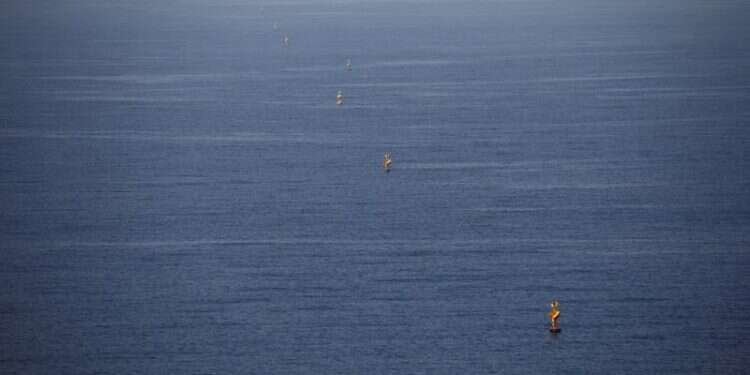 Maritime border markers are seen in the Mediterranean Sea near Lebanon, as seen from Rosh Hanikra, northern Israel, October 28, 2020 Israel-Lebanon maritime border talks postponed